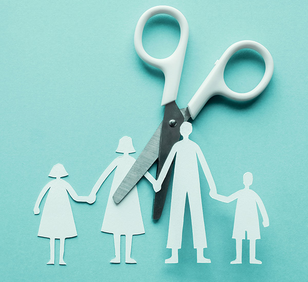 Picture of scissors about to cut a family